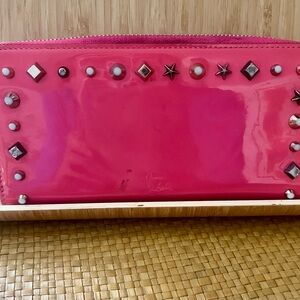 Pre-loved Christian Louboutin long zip pink pannetone wallet! Read listing